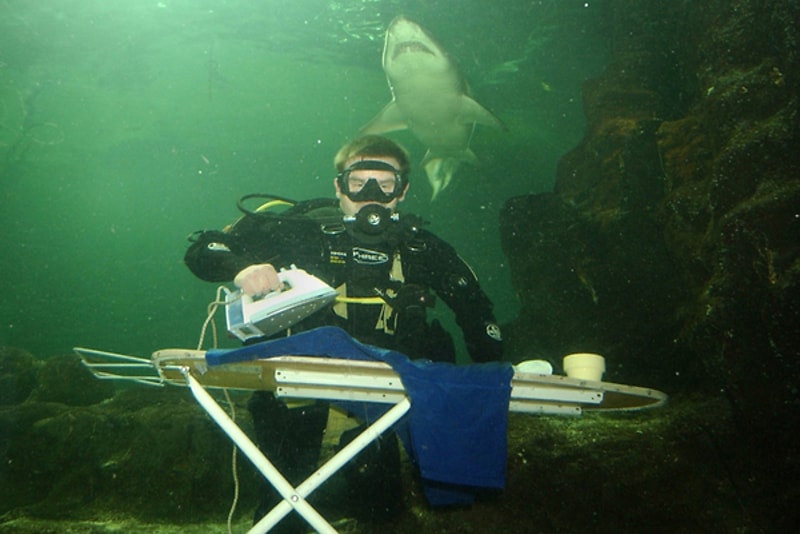 https://tourscanner.com/blog/wp-content/uploads/2017/10/underwater_extreme_ironing-1.jpg