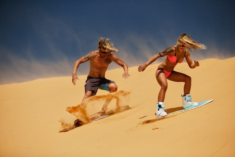 Sandboarding in dunes - Fun things to do in Australia