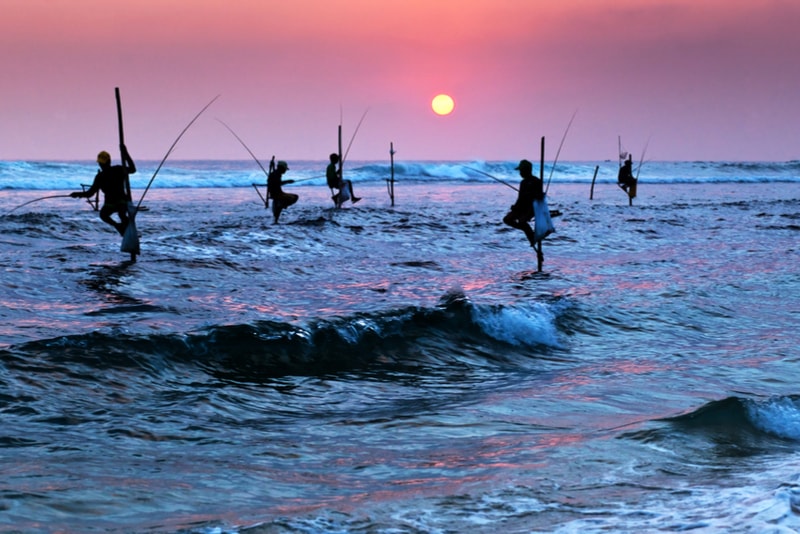 Traditional Fishermen Silhouettes - Places to Visit in Sri Lanka
