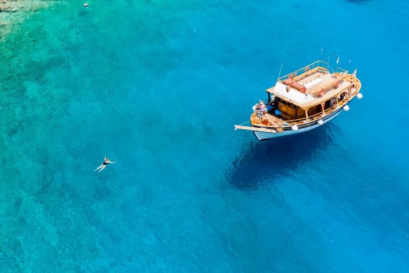 Boat Trip with Guided Snorkeling & Stand-Up Paddling
